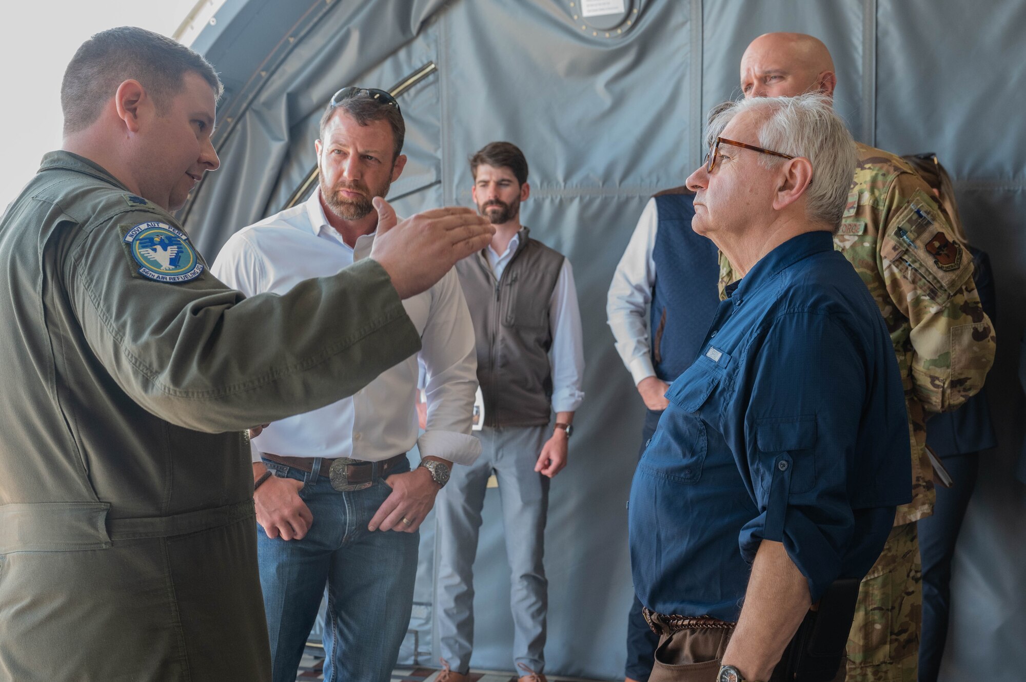 U.S. Air Force Lt. Col. Pete Culbert, 56th Air Refueling Squadron commander, left, briefs 
U.S. Sen. Jack Reed, right, and U.S Sen. Markwayne Mullin, middle, inside a KC-46 Pegasus, during their visit at Altus Air Force Base, Oklahoma, April 12, 2024. Reed is the Chairman of the U.S. Senate Armed Services Committee, which has legislative jurisdiction over the nation’s military. (U.S. Air Force photo by Airman 1st Class Heidi Bucins)