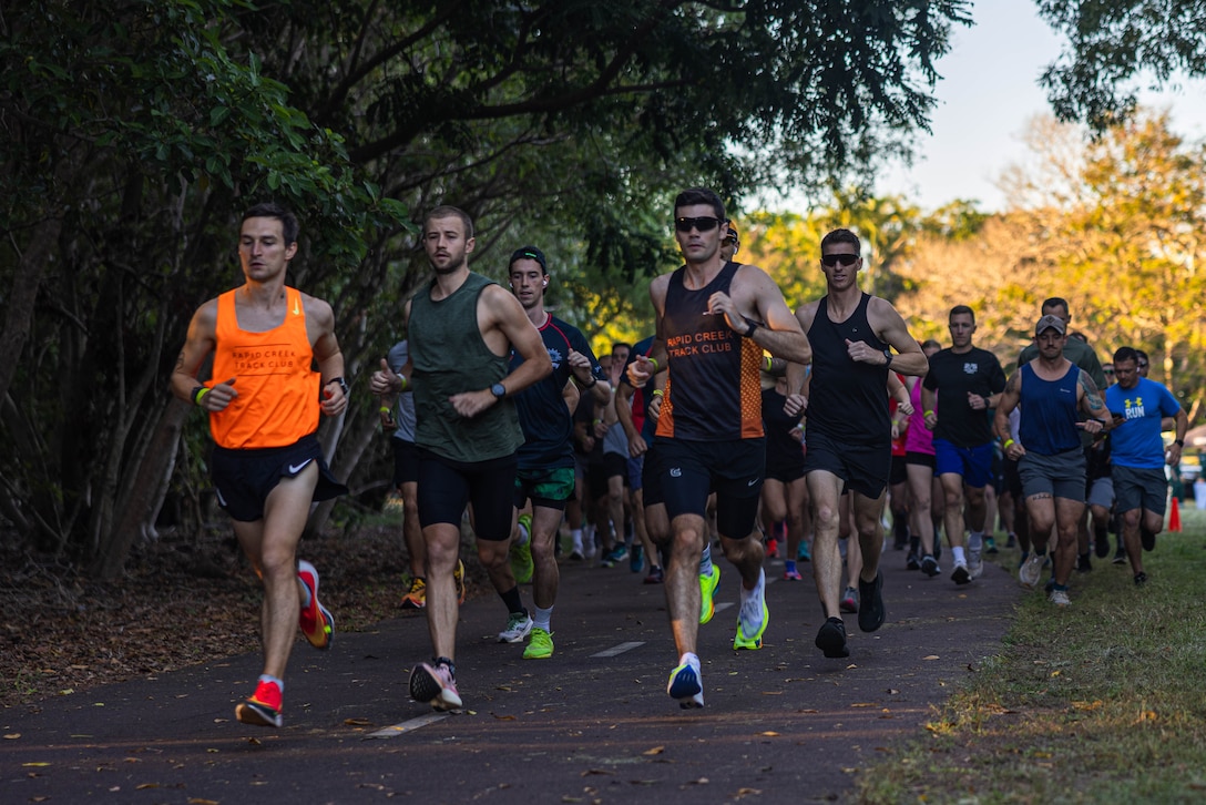 U.S. Marines with 2nd Battalion, 5th Marine Regiment (Reinforced), Marine Rotational Force – Darwin 24.3, Australian Army Soldiers with 1st Brigade and Darwin locals, participate in a Run Army Australia event at East Point Reserve, Darwin, NT, Australia, April 21, 2024. The Run Army Australia 5k and 10k fun run was held to promote health, fitness and wellbeing through a running support program. MRF-D Marines participated in the event to build relations with the community and strengthen the Australian-U.S. Alliance. (U.S. Marine Corps photo by Cpl. Juan Torres)