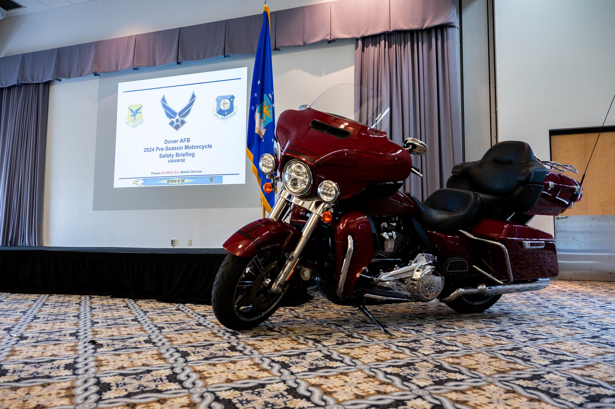 A motorcycle sits on display during a motorcycle safety briefing at Dover Air Force Base, Delaware, April 18, 2024. The brief was one of several events hosted by the 436th Airlift Wing Safety Office in recognition of Motorcycle Safety Day. (U.S. Air Force photo by Airman Liberty Matthews)