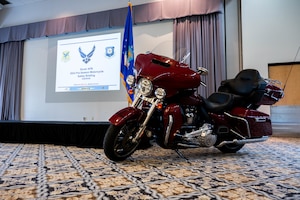 A motorcycle sits on display during a motorcycle safety briefing at Dover Air Force Base, Delaware, April 18, 2024. The brief was one of several events hosted by the 436th Airlift Wing Safety Office in recognition of Motorcycle Safety Day. (U.S. Air Force photo by Airman Liberty Matthews)