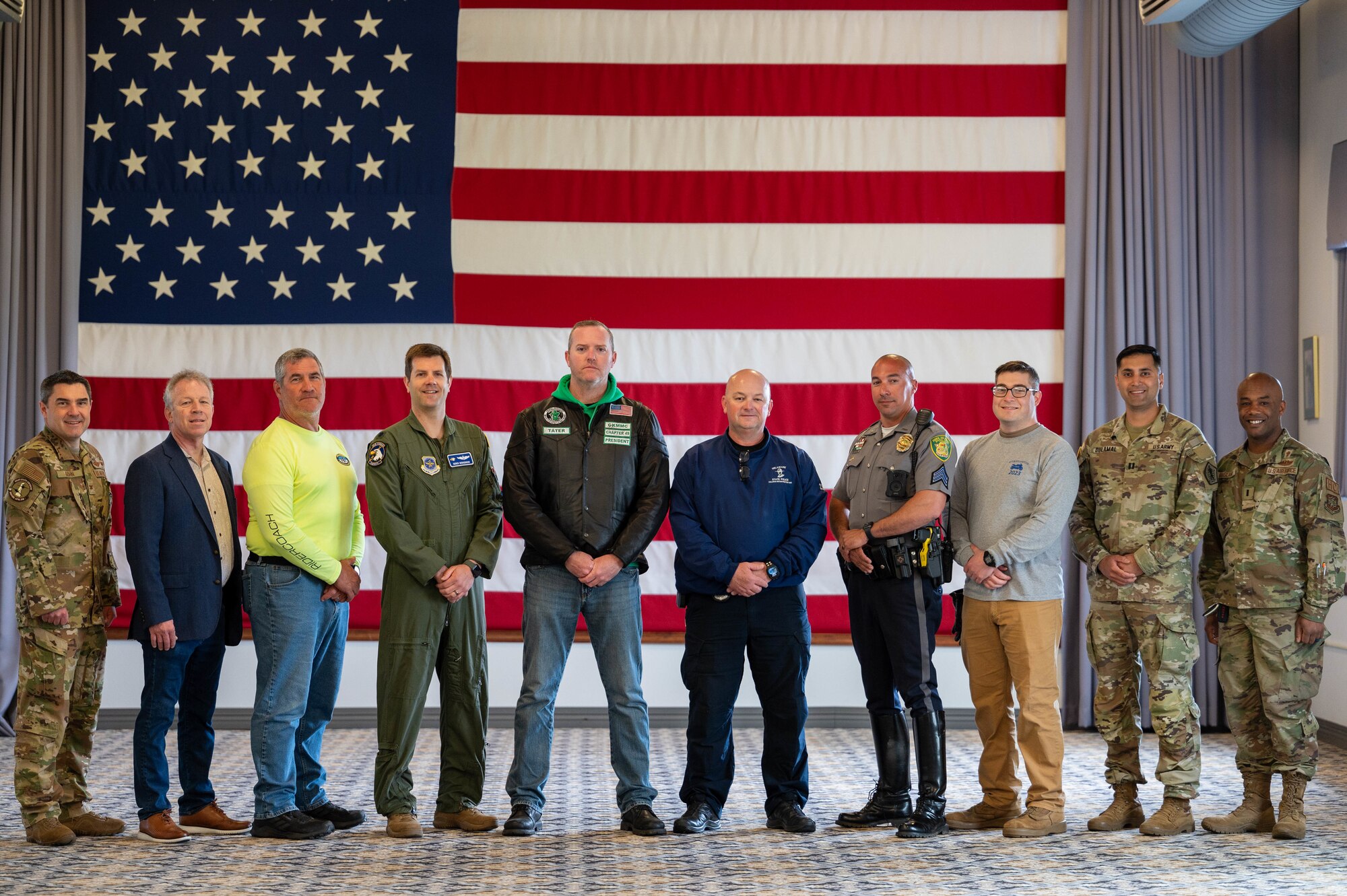 Team Dover members pose for a group photo before a motorcycle safety briefing at Dover Air Force Base, Delaware, April 18, 2024. The brief was one of several events hosted by the 436th Airlift Wing Safety Office in recognition of Motorcycle Safety Day. (U.S. Air Force photo by Airman Liberty Matthews)