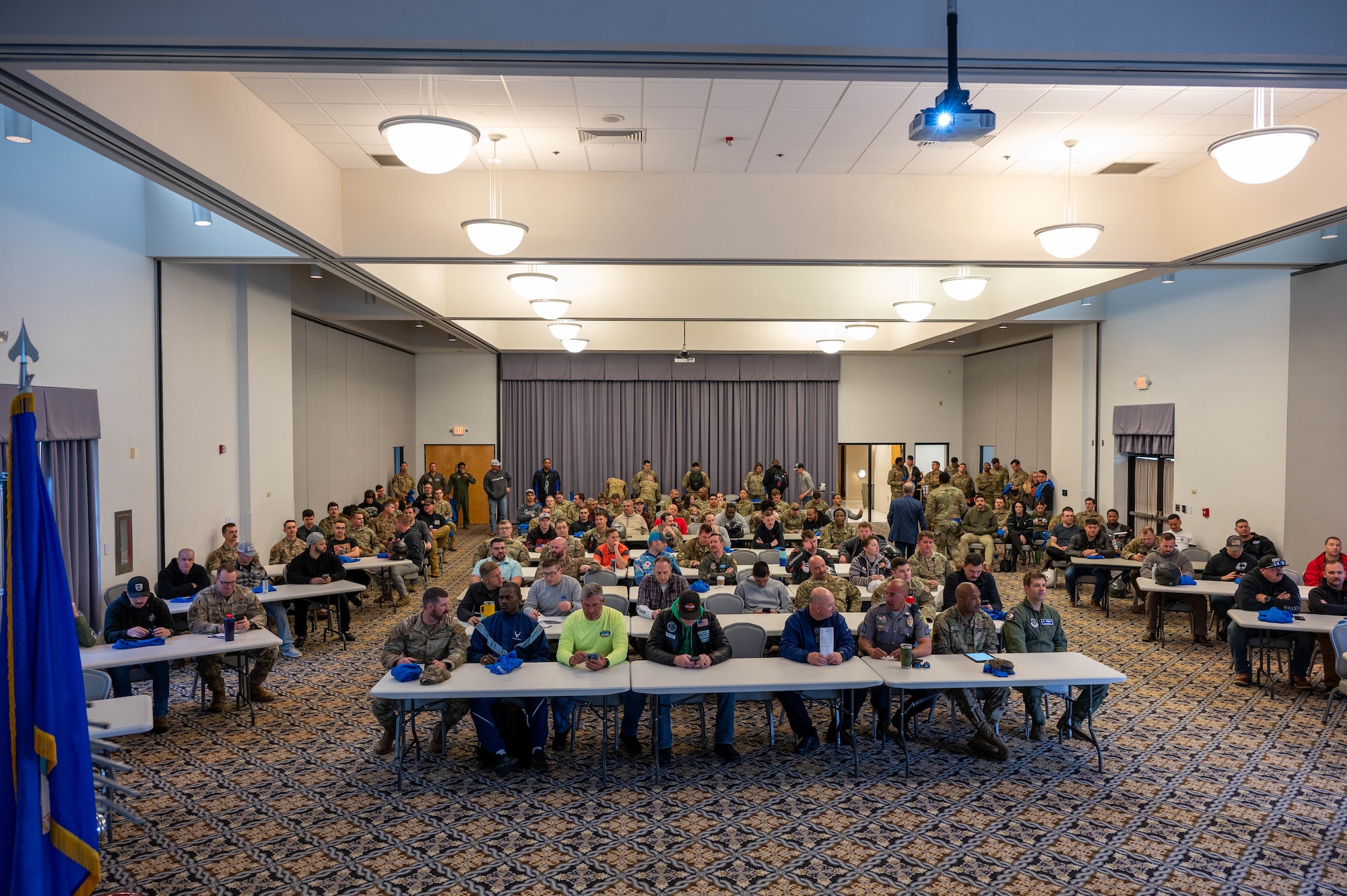 Team Dover members gather at the Landings for a motorcycle safety brief at Dover Air Force Base, Delaware, April 18, 2024. The brief was one of several events hosted by the 436th Airlift Wing Safety Office in recognition of Motorcycle Safety Day. (U.S. Air Force photo by Airman Liberty Matthews)