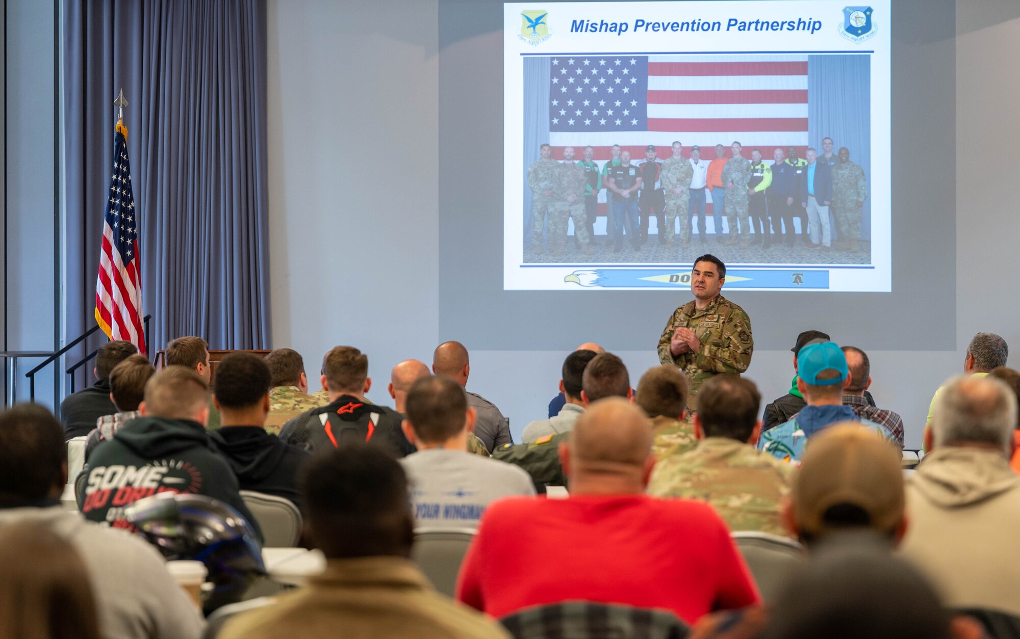 U.S. Air Force Col. Rusty Gohn, 436th Airlift Wing deputy commander, briefs the audience during a motorcycle safety event at Dover Air Force Base, Delaware, April 18, 2024. The brief was one of several events hosted by the 436th Airlift Wing Safety Office in recognition of Motorcycle Safety Day. (U.S. Air Force photo by Airman Liberty Matthews)