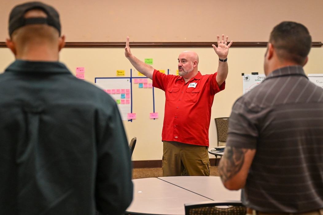 John Larson, Defense Acquisition University professor of systems engineering, teaches the Warfighter-Centered Design (WCD)/Military Scrum Master (MSM) at the Recce Point Club on Beale Air Force Base, California, April 9, 2024.