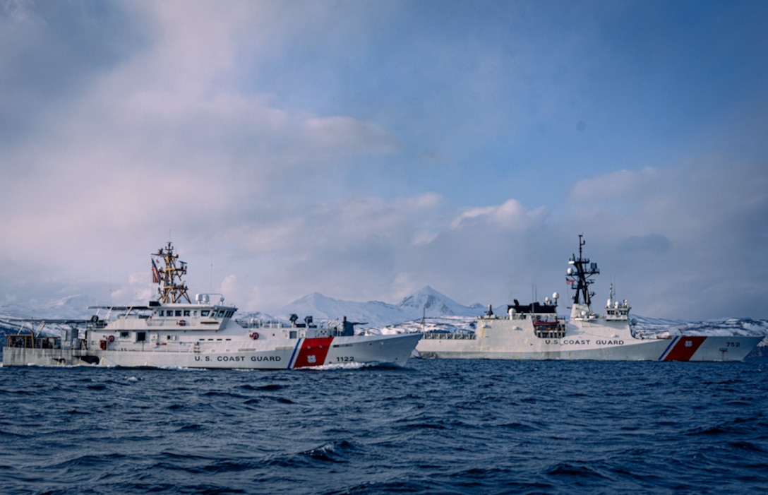 U.S. Coast Guard Cutters Stratton (WMSL 752) and Bailey Barco (WPC 1122) rendezvous in Beaver Inlet near Dutch Harbor, Unalaska, Alaska, Feb. 28, 2024. Both cutters conducted joint cutter boat training and formation steaming while on patrol in the Bering Sea and Gulf of Alaska for fisheries enforcement, safety of life at sea, and sovereignty projection. (U.S. Coast Guard courtesy photo)