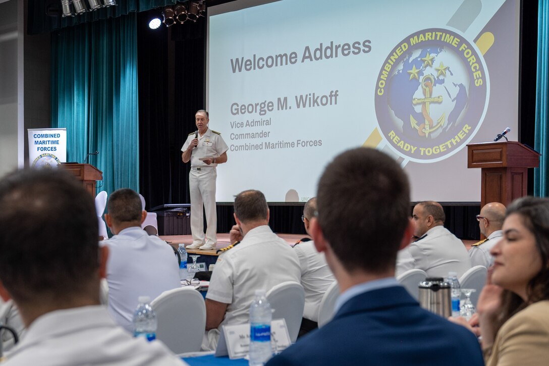 240416-N-XA496-1018 MANAMA, Bahrain (April 16, 2024) Vice Adm. George Wikoff, commander of Combined Maritime Forces, gives opening remarks to participants of the 2024 Maritime Security Conference (MSC) in Manama, Bahrain, April 16. MSC is an annual conference where leaders from Combined Maritime Forces’ partner nations come together to review the accomplishments of the past year and coordinate plans to enhance future maritime security in the Middle East region. (Official U.S. Navy photo)