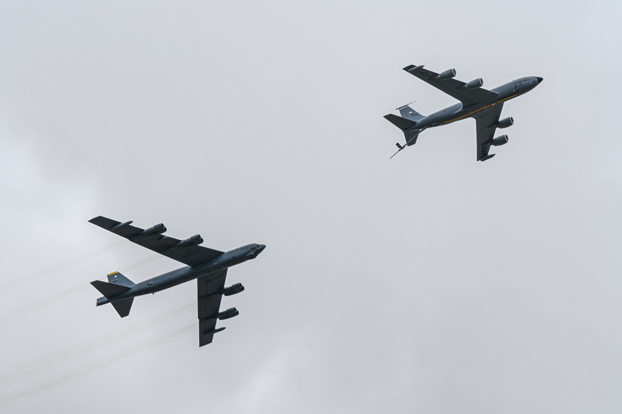Two military aircrafts fly overhead