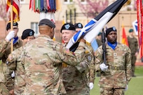 Lt. Gen. John Kolasheski, the outgoing commander of V Corps, hands V Corps’ colors to Gen. Darryl Williams, the commanding general of U.S. Army Europe and Africa, during the Victory Corps change of command ceremony in Poznan, Poland, April 8, 2024. Kolasheski handing the colors to Williams signified the completion of his mission as the V Corps commanding general. (U.S. Army photo by Staff Sgt. Jameson Harris)