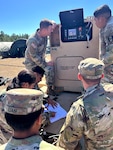 U.S. Army soldiers (team 1) from the 528th Field Hospital following procedures to restore power to the Microgrid System during a customer test conducted by the U.S. Army Test and Evaluation Activity at Fort Liberty, North Carolina on Mar. 21, 2024.