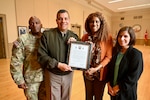From left, Command Sgt. Maj. Ronald L. Smith, Senior Enlisted Leader, D.C. National Guard; Maj. Gen. John C. Andonie, commanding general (interim), D.C. National Guard; Dr. Theresa Owolabi, Sexual Assault Response Program Manager, D.C. National Guard, and Amanda Dunsford, Victim Advocate Coordinator, D.C. National Guard, stand for a photograph following the command team signing a joint proclamation in recognition of Sexual Assault Awareness and Prevention Month, at the D.C. Armory, April 17, 2024.  The D.C. National Guard continues to take bold actions on victims care and support, accountability, prevention, climate and culture. (U.S. Air National Guard photo by Master Sgt. Arthur M. Wright)