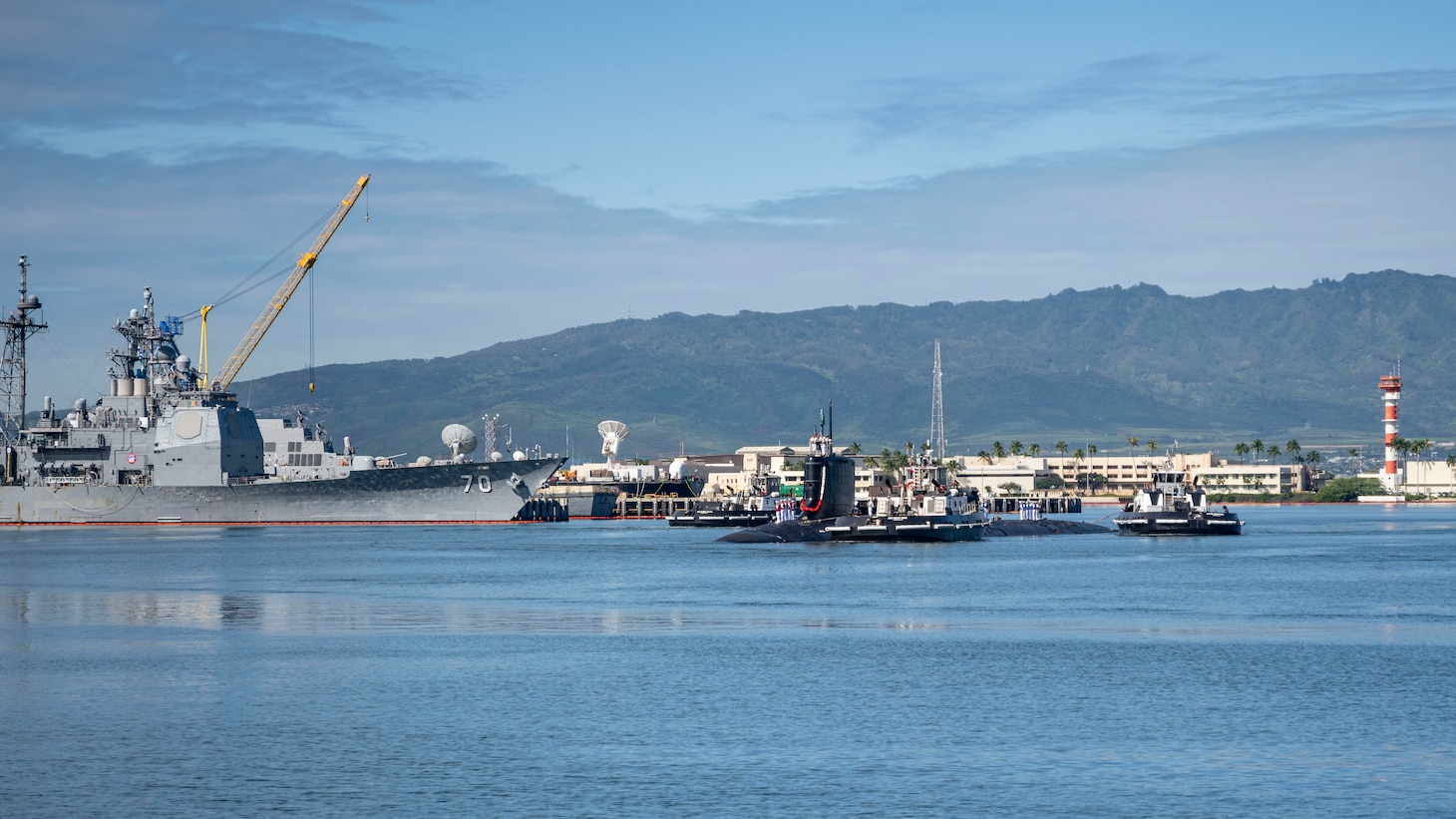 JOINT BASE PEARL HARBOR-HICKAM (Jan. 31, 2024) — The Virginia-class fast-attack submarine USS North Carolina (SSN 777) returns to Joint Base Pearl Harbor-Hickam after a seven-month deployment, Jan. 31, 2024. USS North Carolina is the fourth submarine of the Virginia-class; the first class designated and built post-Cold War in order to meet the challenges of the 21st century, and has improved stealth; sophisticated surveillance capabilities, and special warfare enhancements that enable it to meet the Navy's multi-mission requirements.  (U.S. Navy photo by Mass Communication Specialist 1st Class Scott Barnes)