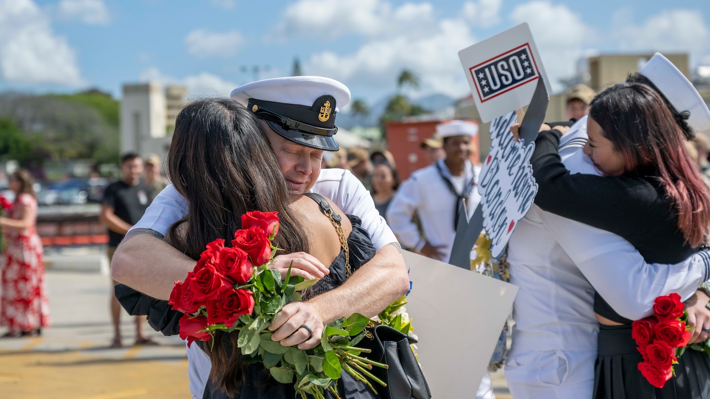 JOINT BASE PEARL HARBOR-HICKAM (Jan. 31, 2024) — Sailors embrace their loved ones during the homecoming of the Virginia-class fast-attack submarine USS North Carolina (SSN 777) on Joint Base Pearl Harbor-Hickam, Jan. 31, 2024. USS North Carolina is the fourth submarine of the Virginia-class; the first class designated and built post-Cold War in order to meet the challenges of the 21st century, and has improved stealth; sophisticated surveillance capabilities, and special warfare enhancements that enable it to meet the Navy's multi-mission requirements.  (U.S. Navy photo by Mass Communication Specialist 1st Class Scott Barnes)