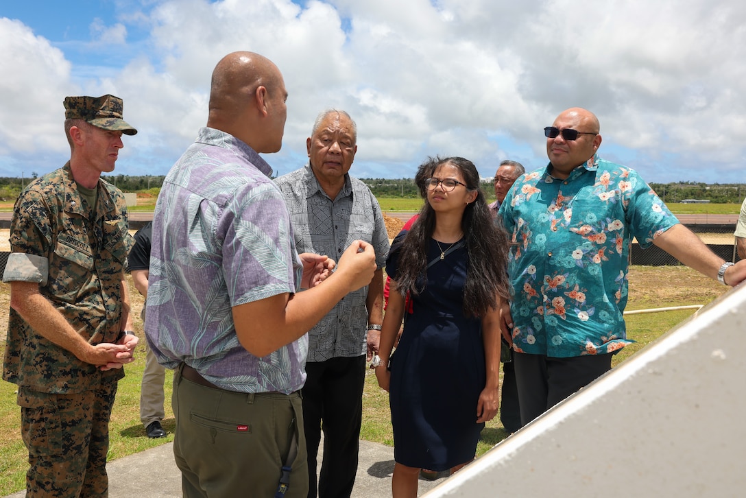 From left to right, Albert Borja, environmental director for Marine Corps Base (MCB) Camp Blaz, talks about the historical significance of the Sabånan Fadang site with the Honorable David Apatang, Lieutenant Governor of the Commonwealth of the Northern Marianas Islands; Guam Youth Lt. Gov. Molly Shae Dela Cruz; and the Honorable Joshua Tenorio, Lieutenant Governor of Guam, on MCB Camp Blaz, Guam, April 19, 2024. The Lieutenant Governors visited MCB Camp Blaz to better understand the future, Marine Corps presence on Guam. During the tour, the group visited the Main Cantonment and the Live Fire Training Range Complex to not only see where the Marines would live, work, and train, but to discuss cultural and natural resource protection and future civilian job growth. (U.S. Marine Corps photo by Lance Cpl. Ryan Little)