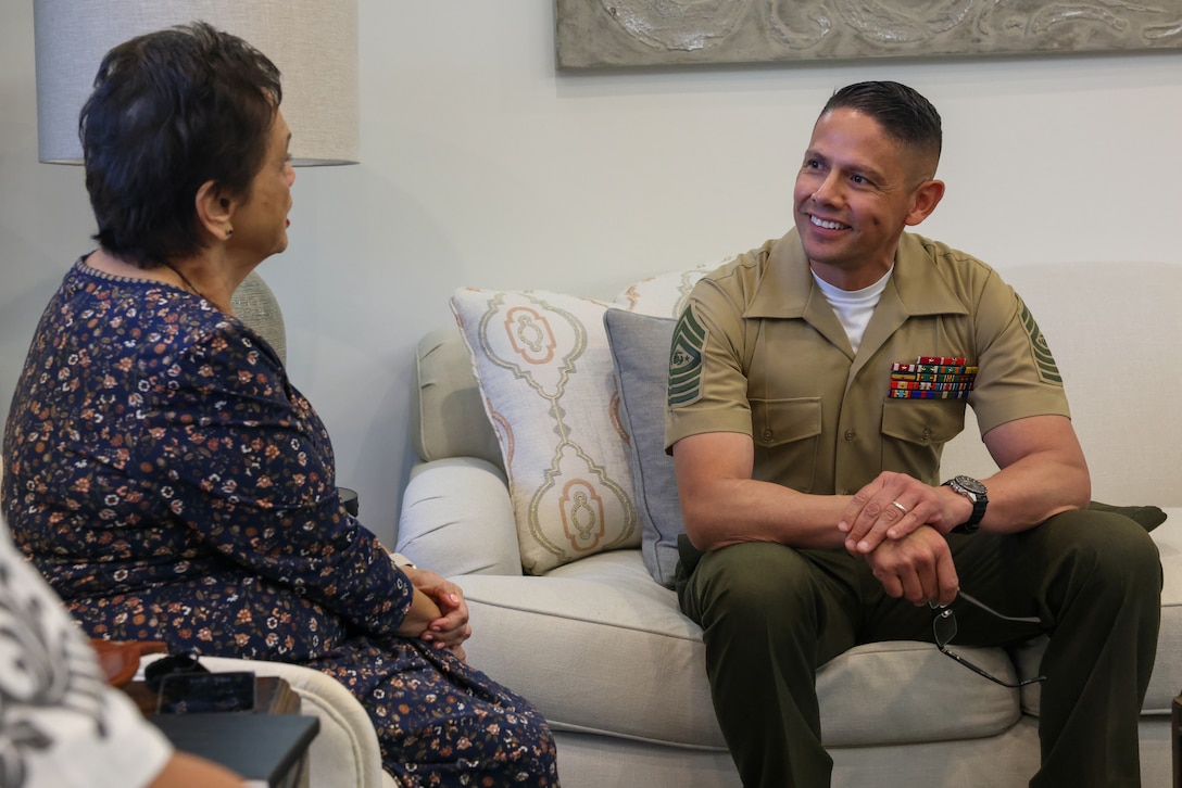 U.S. Marine Corps Sgt. Maj. Carlos Ruiz, Sergeant Major of the Marine Corps, speaks with the Honorable Lourdes Leon Guerrero, the Governor of Guam, during a visit to her office in Hagåtña, Guam, April 16, 2024. Ruiz visited  Guam and Marine Corps Base (MCB) Camp Blaz to oversee the progress of the base, better understand the tactical positioning of Marines in the INDOPACIFIC, and tour the facilities available on MCB Camp Blaz. “There’s no better service than the United States Marine Corps to be here, to be ready to pivot from this place…[for] anything that’s needed by any combatant commander,” said Ruiz. (U.S. Marine Corps photo by Lance Cpl. Ryan Little)