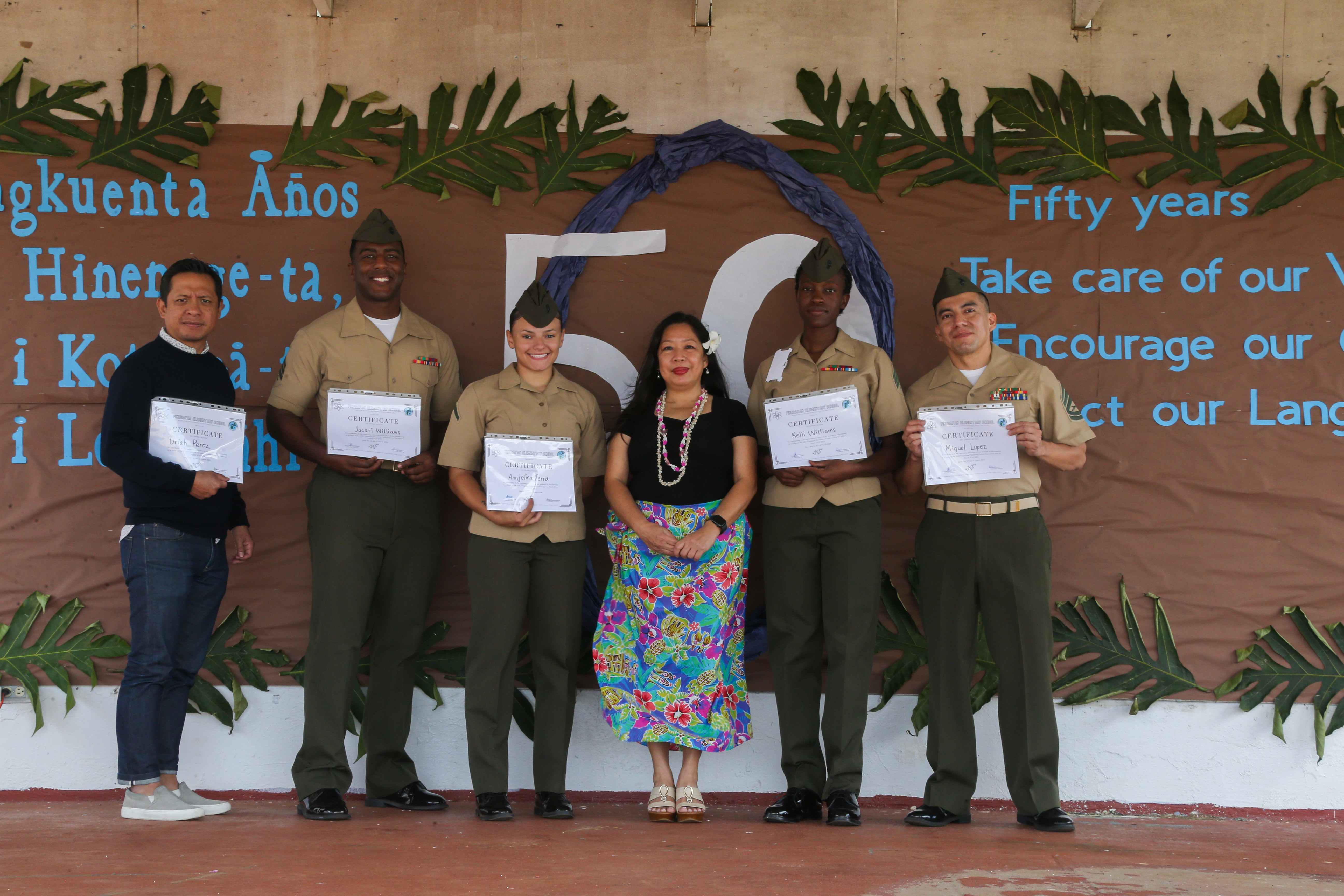 Marines from Marine Corps Base Camp Blaz volunteer in local schools