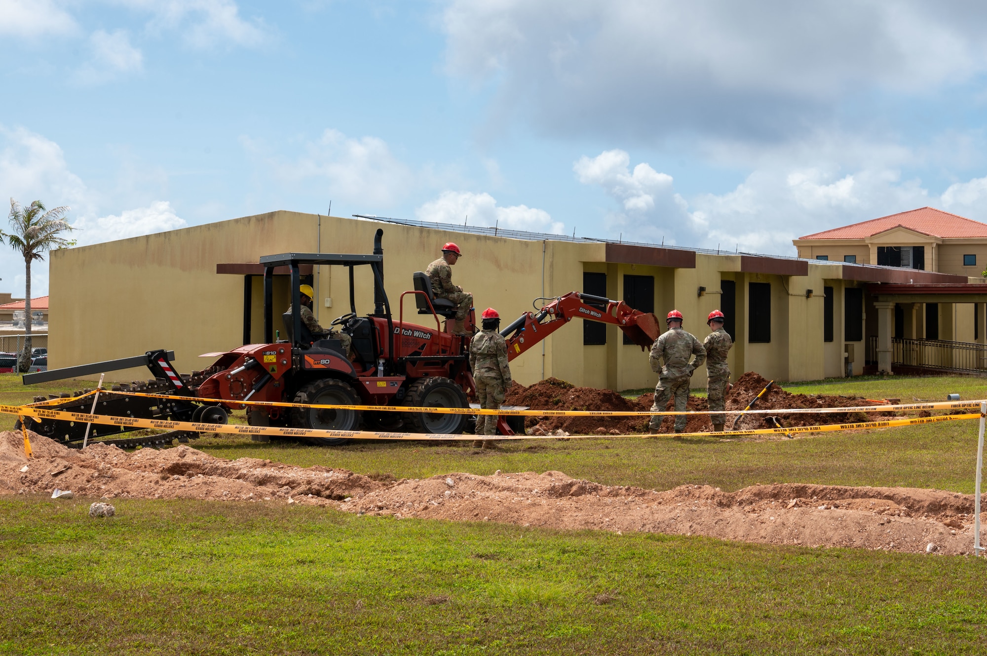 Multiple Air Force Specialty Codes work together to support the 36th Force Support Squadron’s initiative to repair the CDC of damages caused by Typhoon Mawar. (U.S. Air Force photo by Airman 1st Class Audree Campbell)