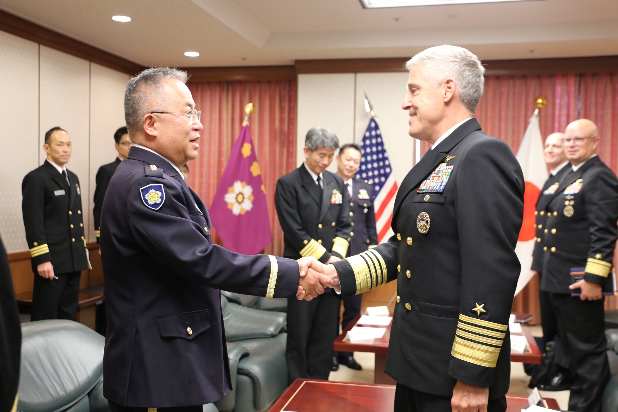 Adm. Stephen Koehler, commander, U.S. Pacific Fleet, right, shakes hands with Gen. Yoshihide Yoshida, chief of staff, Joint Staff of the Japan Self Defense-Forces, following a meeting in Tokyo, April 17, 2024. Koehler met with Yoshida to discuss the increasing security challenges in the Indo-Pacific and reaffirmed the U.S. Japan alliance as the cornerstone of peace, security, and prosperity in the Indo-Pacific. (Photo Courtesy of U.S. Navy)