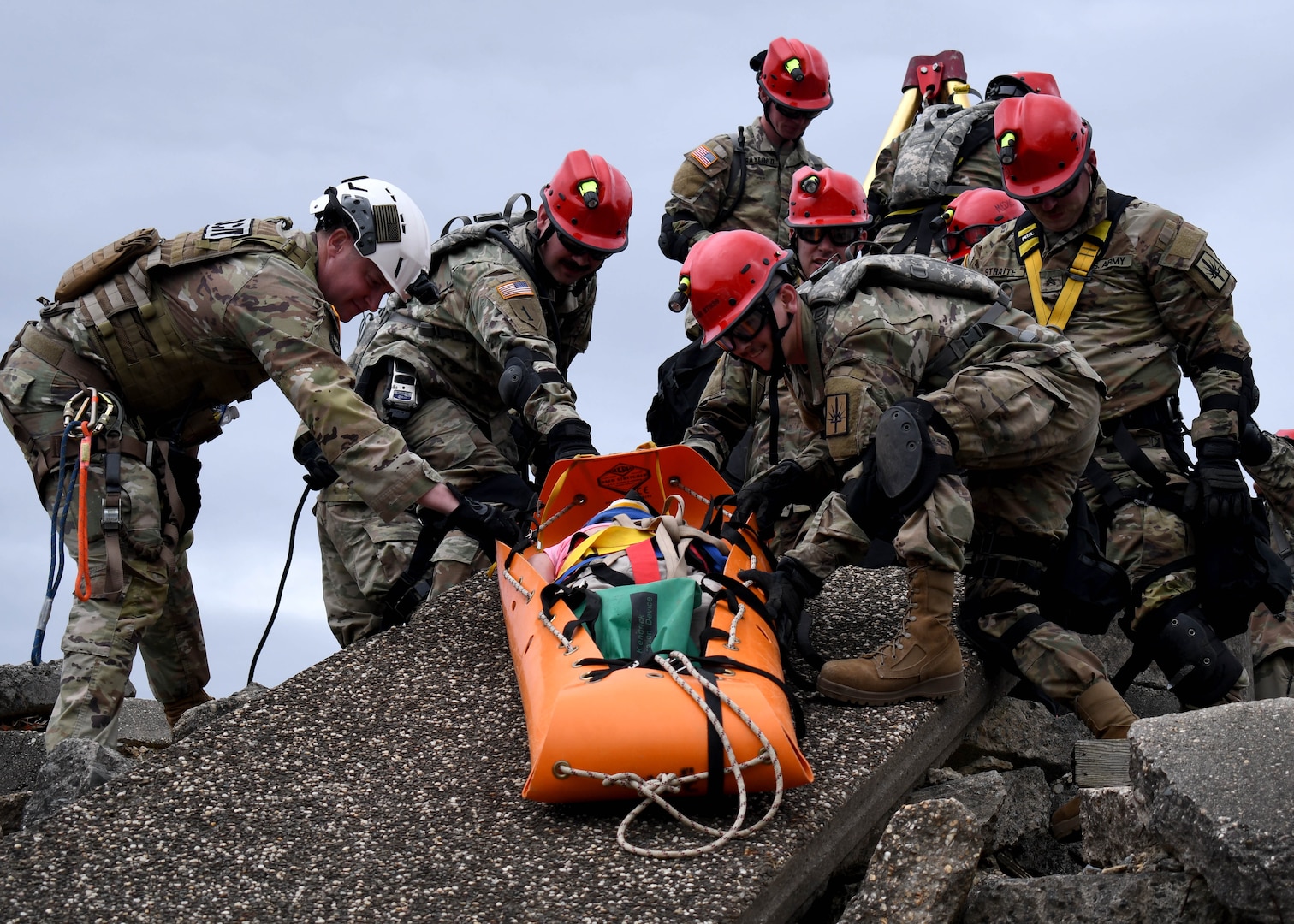 U.S. Army Soldiers from the New York National Guard’s 827th Engineer Company, 104th Military Police Battalion, lower a simulated casualty from rubble during a training exercise April 17, 2024. Led by personnel from the 42nd Infantry Division making up the Region II Homeland Response Force, the week-long exercise brought together elements from across the New York National Guard.