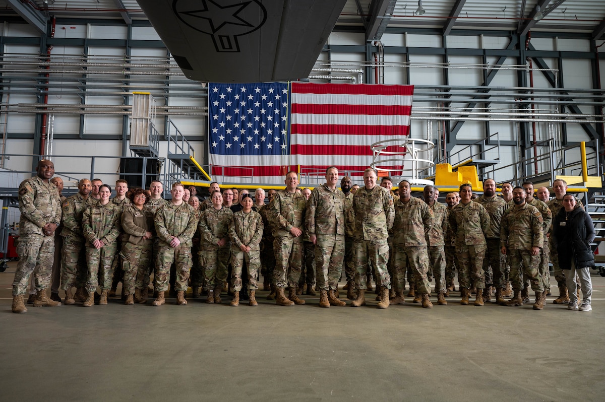 Religious support military members gather for a group photo during a joint religious support team training