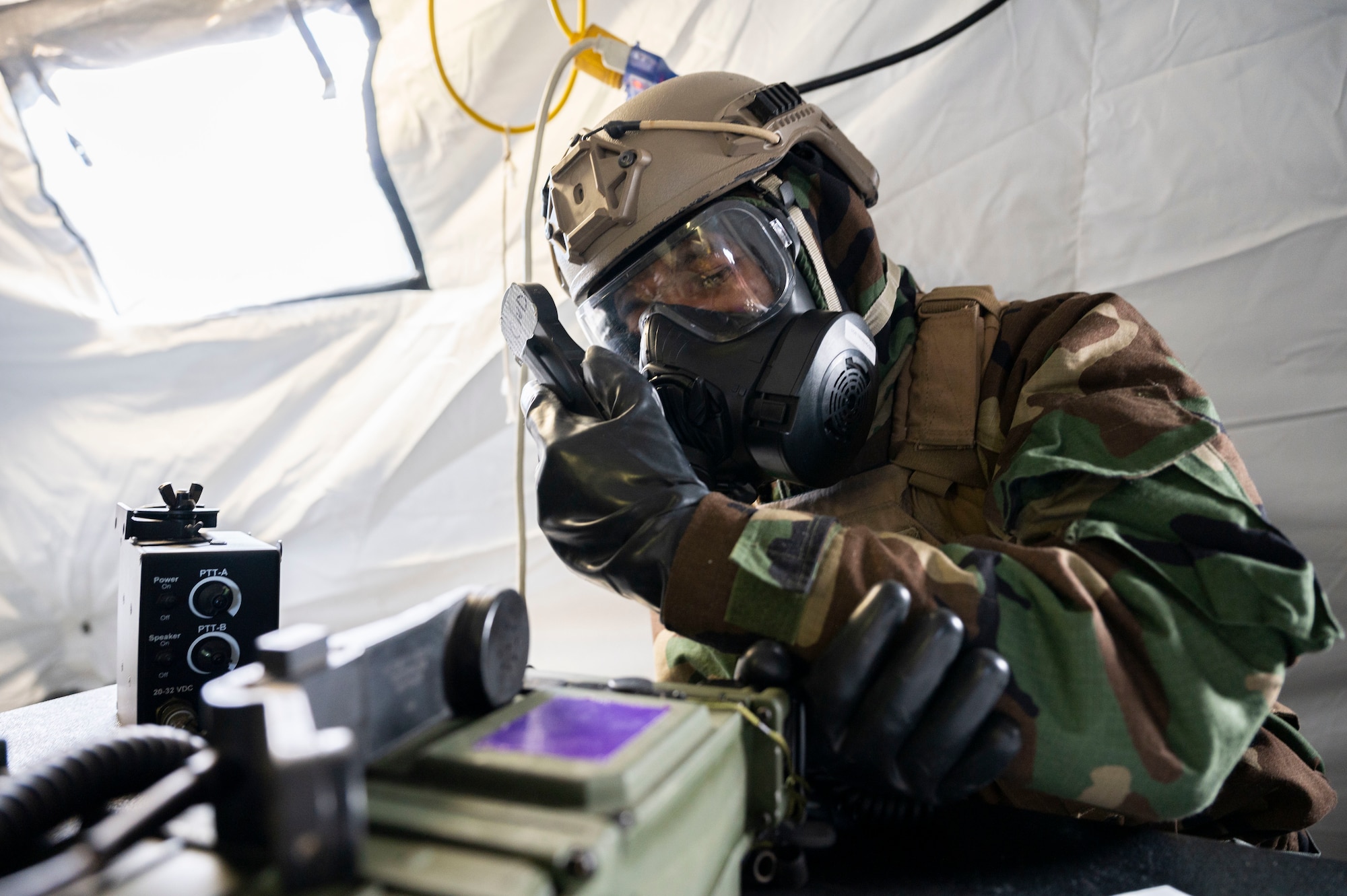 621st CRW member responds to a call during a simulated chemical attack.