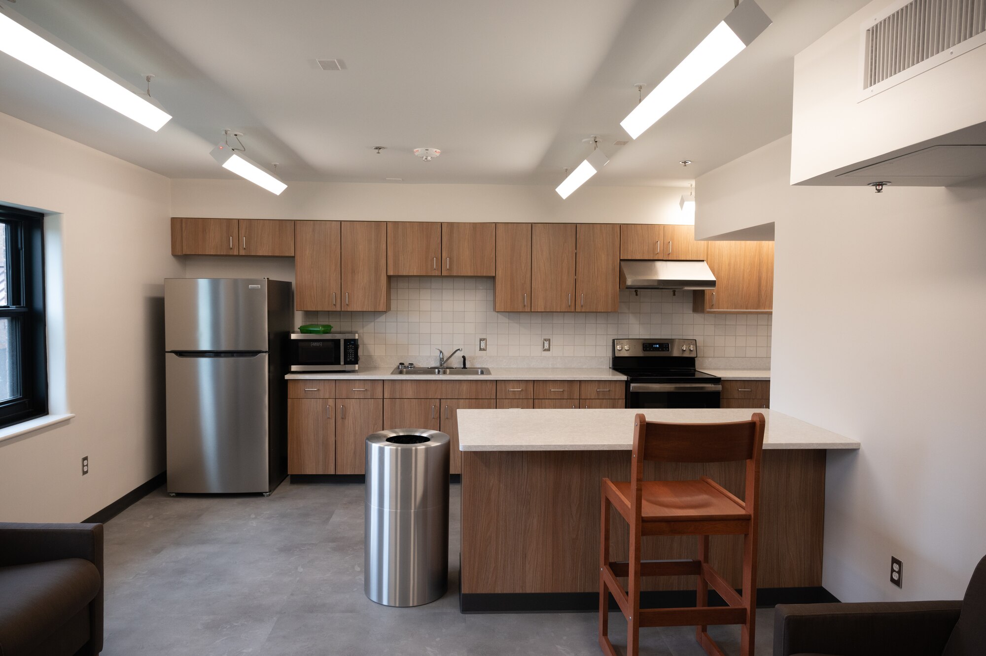 The Discovery Hall dormitory was recently renovated for U.S. Airmen at Whiteman Air Force Base, Mo., April 3, 2024. The community kitchen is designed not only for Airmen to prepare their food but also to have a place to relax and enjoy time with fellow residents. (U.S. Air Force photo by Airman 1st Class Bryce Moore)