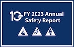 Blue background with white text stating "FY 2023 Annual Safety Report" and three triangles towards the bottom of the rectangle that shows various hazard signs.