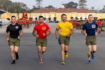 U.S. Marine Corps Drill Masters with Recruit Training Regiment, lead the motivational run for Alpha Company, 1st Recruit Training Battalion, at Marine Corps Recruit Depot San Diego, California, April 18, 2024. The motivational run is the last physical training exercise Marines conduct while at MCRD. (U.S. Marine Corps photo by Cpl. Alexander O. Devereux)
