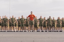 U.S. Marines with Alpha Company, 1st Recruit Training Battalion, execute dynamic warm-ups prior to a motivational run at Marine Corps Recruit Depot San Diego, California, April 18, 2024. The motivational run is the final training event new Marines complete before graduating which consists of a three-mile run throughout the Depot. (U.S. Marine Corps photo by Lance Cpl. Alexandra M. Earl)