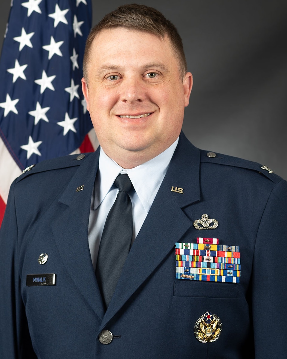 Official portrait of Colonel Michael P. Mihalik in a studio photo wearing Air Force dress blues.