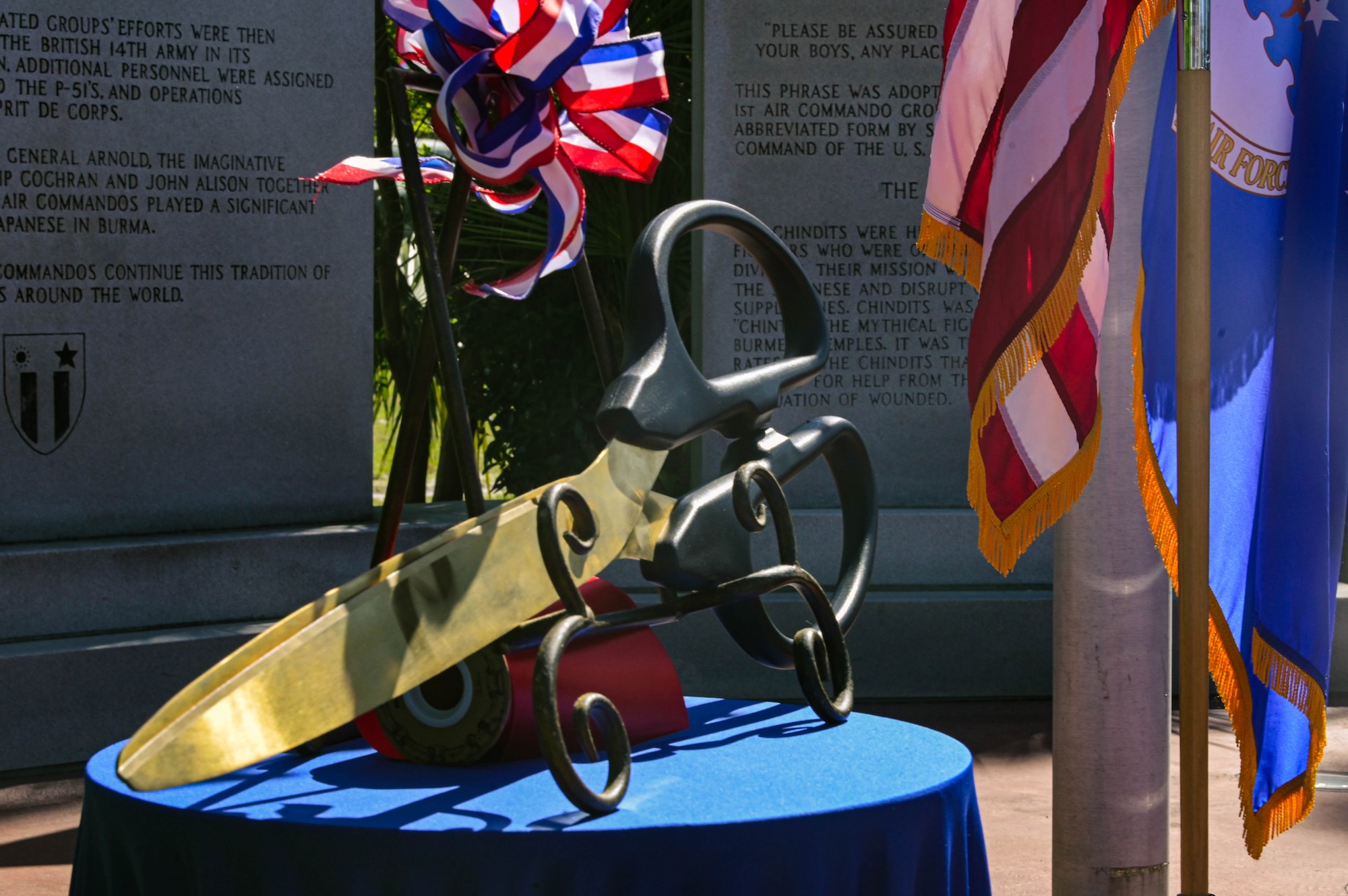 Ceremonial scissors are displayed during the grand reopening of the memorial air park at Hurlburt Field, Florida, April 22, 2024.