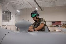 U.S. Marines with VMUT-2 familiarize themselves with 2nd MAW’s first delivered MQ-9A Reaper unmanned aircraft