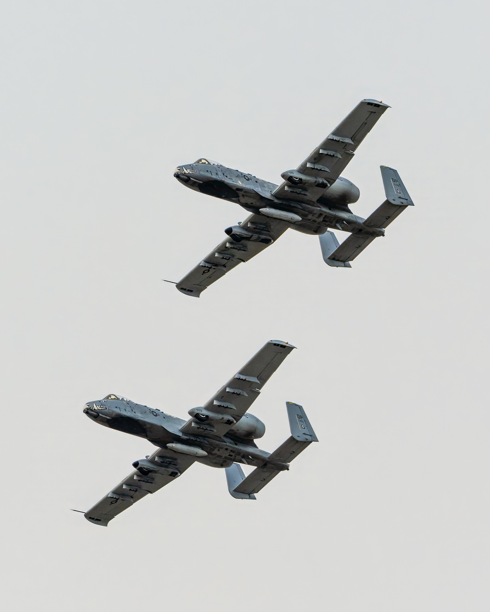 Two U.S. Air Force A-10 Thunderbolt II aircraft from 924th Fighter Group at Davis-Monthan Air Force Base, Ariz., perform an aerobatic display during the Thunder Over Louisville air show in Louisville, Ky., April 20, 2024. This year’s event featured more than two-dozen military and civilian planes, including the Kentucky Air National Guard’s C130J Super Hercules. (U.S. Air National Guard photo by Dale Greer)