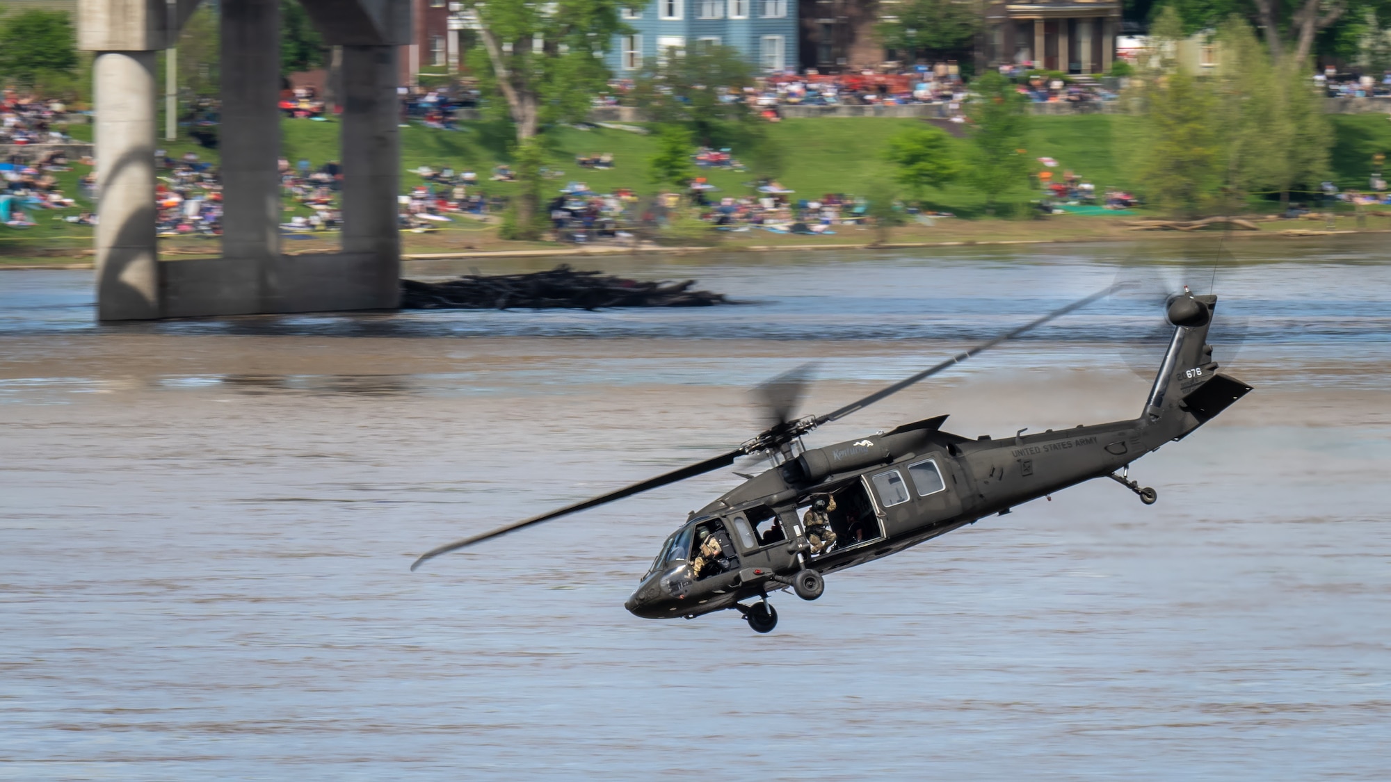 A UH-60 Black Hawk helicopter assigned to the Kentucky Army National Guard’s 63rd Theater Aviation Brigade performs an aerial demonstration during the Thunder Over Louisville air show in Louisville, Ky., April 20, 2024. This year’s event featured more than two-dozen military and civilian planes, including the Kentucky Air National Guard’s C130J Super Hercules. (U.S. Air National Guard photo by Dale Greer)