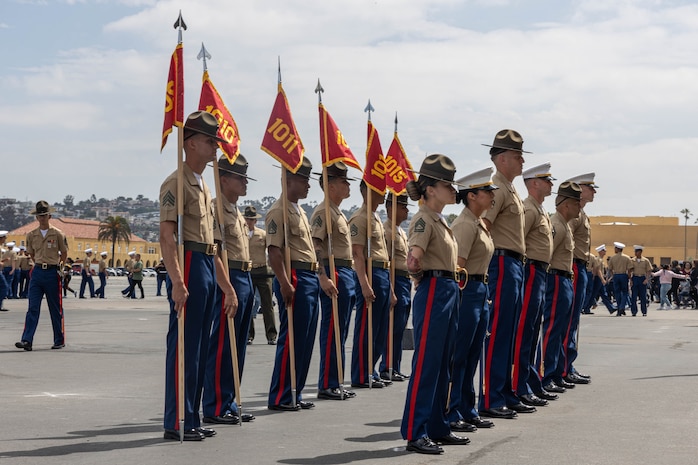 U.S. Marine Corps staff and drill instructors with Alpha Company, 1st Recruit Training Battalion, stand in formation during a graduation ceremony at Marine Corps Recruit Depot San Diego, California, April 19, 2024. Graduation took place at the completion of the 13-week transformation, which included training for drill, marksmanship, basic combat skills, and Marine Corps customs and traditions. (U.S. Marine Corps photo by Cpl. Sarah M. Grawcock)