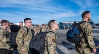 A photo of Airmen waiting on the flightline.