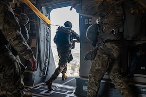 A U.S. Army Soldier jumps out of a U.S. Air Force C-17 Globemaster III for airborne jump training during Korea Flight Training 24 at Osan Air Base, Republic of Korea, April 18, 2024. KFT 24 is a routine, regularly scheduled annual training that is designed to improve interoperability throughout the Indo-Pacific area of responsibility, while strengthening the U.S.-ROK alliance and their commitments to maintain peace in Northeast Asia. (U.S. Air Force photo by Airman 1st Class Chase Verzaal) (This photo has been altered for security purposes.)