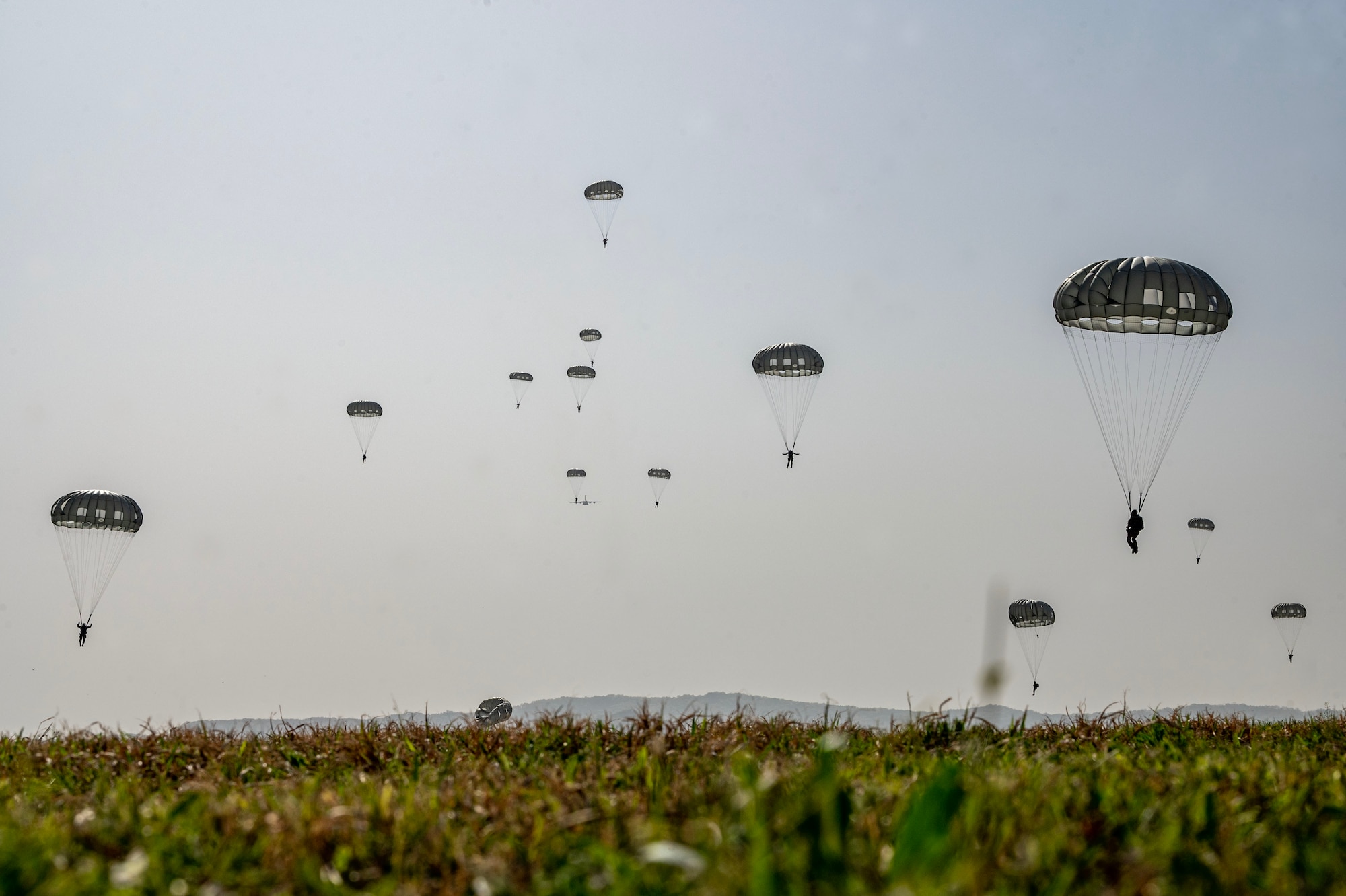 Republic of Korea and U.S. service members participate in airborne jump training during Korea Flight Training 24 at Osan Air Base, ROK, April 18, 2024. KFT 24 is a routine, regularly scheduled annual training that is designed to improve interoperability throughout the Indo-Pacific area of responsibility, while strengthening the U.S.-ROK alliance and their commitments to maintain peace in Northeast Asia. (U.S. Air Force photo by Staff Sgt. Aubree Owens)