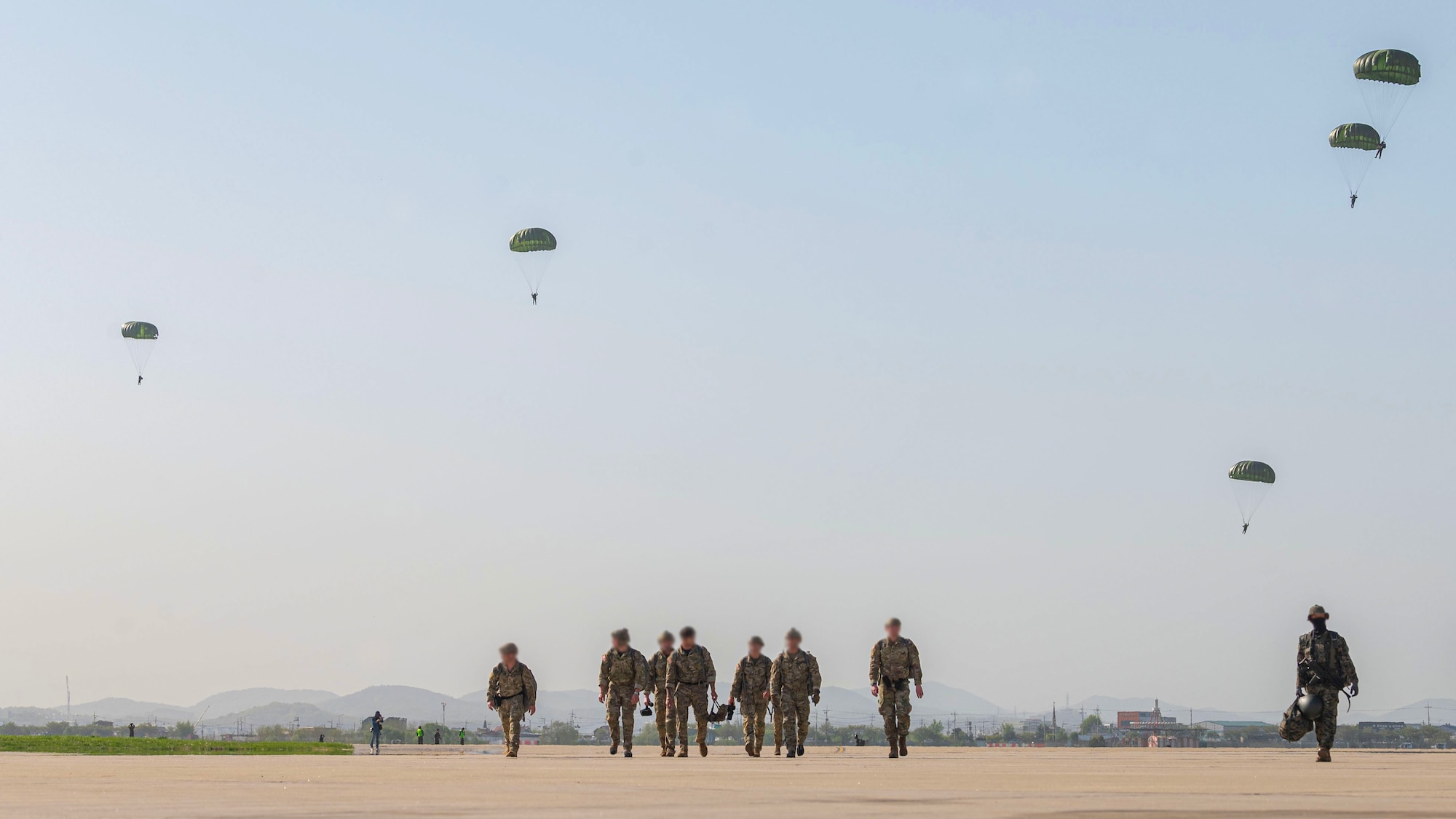 Republic of Korea and U.S. service members participate in airborne jump training during Korea Flight Training 24 at Osan Air Base, ROK, April 18, 2024. KFT is a routine, regularly scheduled annual training that is designed to improve interoperability throughout the Indo-Pacific area of responsibility, while strengthening the U.S.-ROK alliance and their commitments to maintain peace in Northeast Asia. (U.S. Air Force photo by Staff Sgt. Aubree Owens)