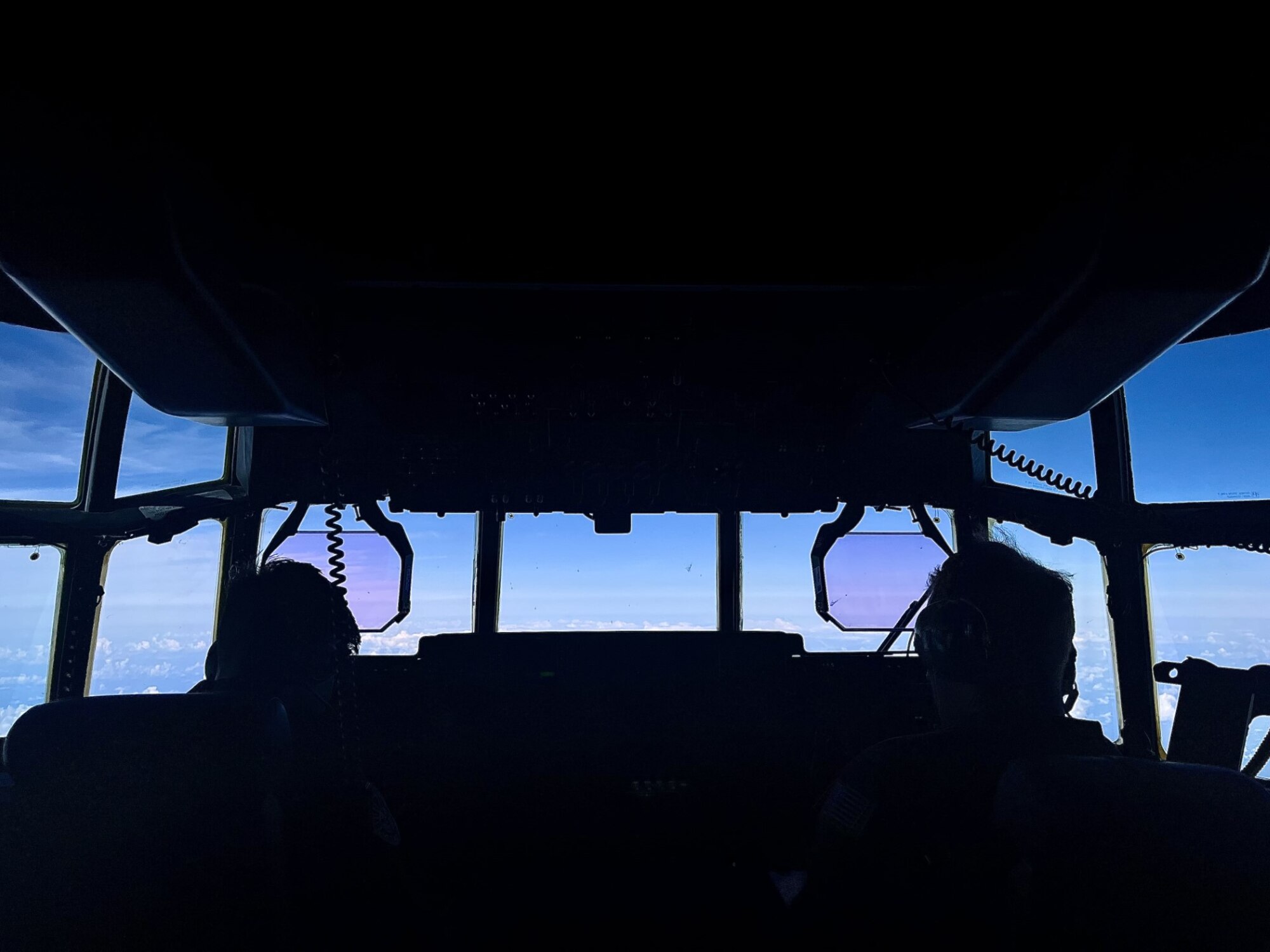 Two pilots conduct a Max Endurance mission, flying in the cockpit.