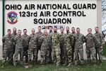 Airmen assigned to the 123rd Air Control Squadron pose for a portrait alongside service members from Lithuania and Hungary during a joint training exercise March 22, 2024, in Blue Ash, Ohio. The training included air battle management, ground control intercept, large-force employment and air-to-air combat beyond visual range.