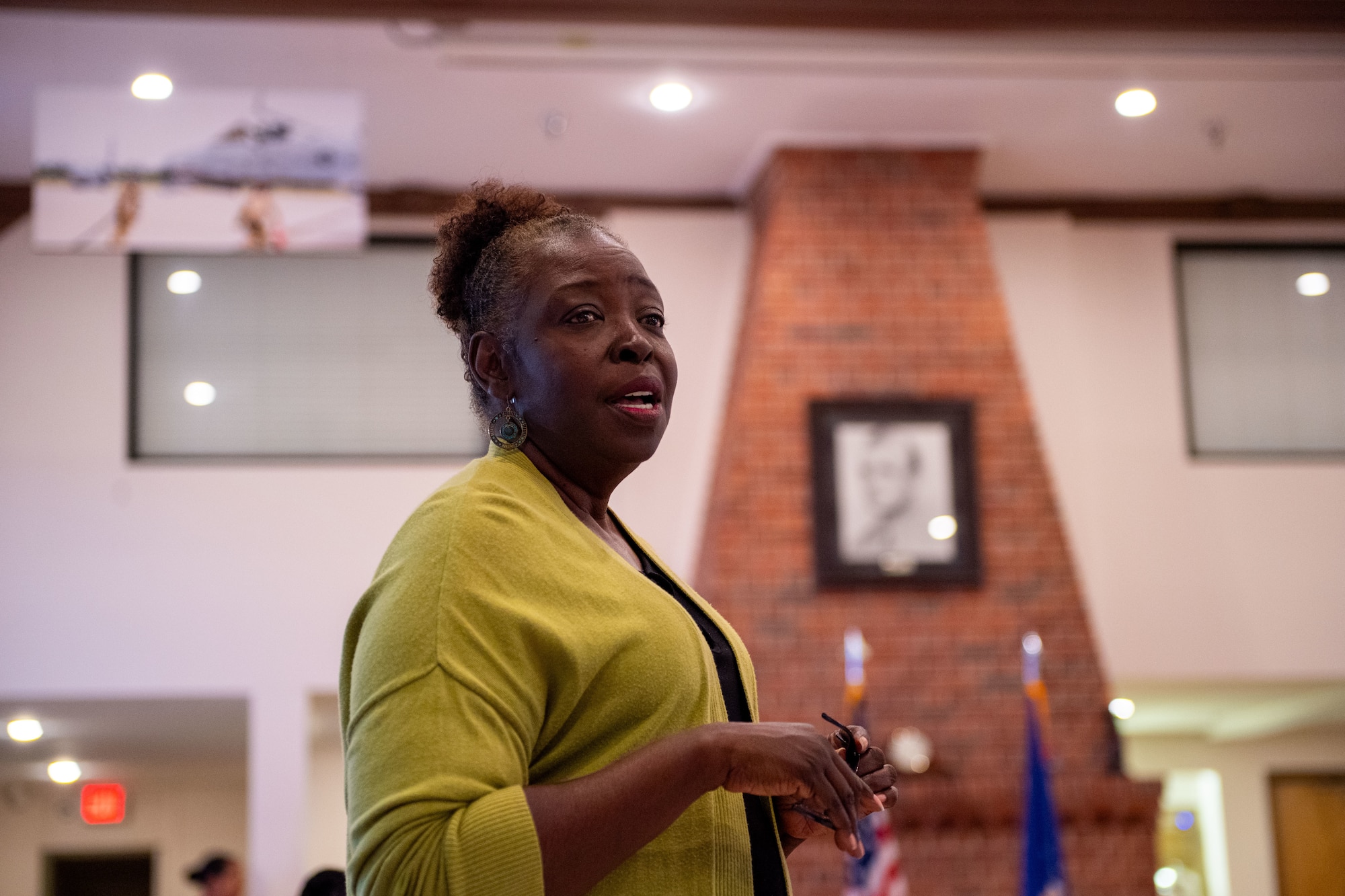 A representative from the 23rd Force Support Squadron Military and Family Readiness Center speaks during an ice-breaker exercise during a Widows and Widowers Connection Group event at Moody Air Force Base, Georgia, April 17, 2024. Through the Widows and Widowers Connection & Support Group, a beacon of enduring support illuminates the path for those who have lost their loved ones, ensuring their memory never fades. (U.S. Air Force photo by 2nd Lt. Benjamin Williams)