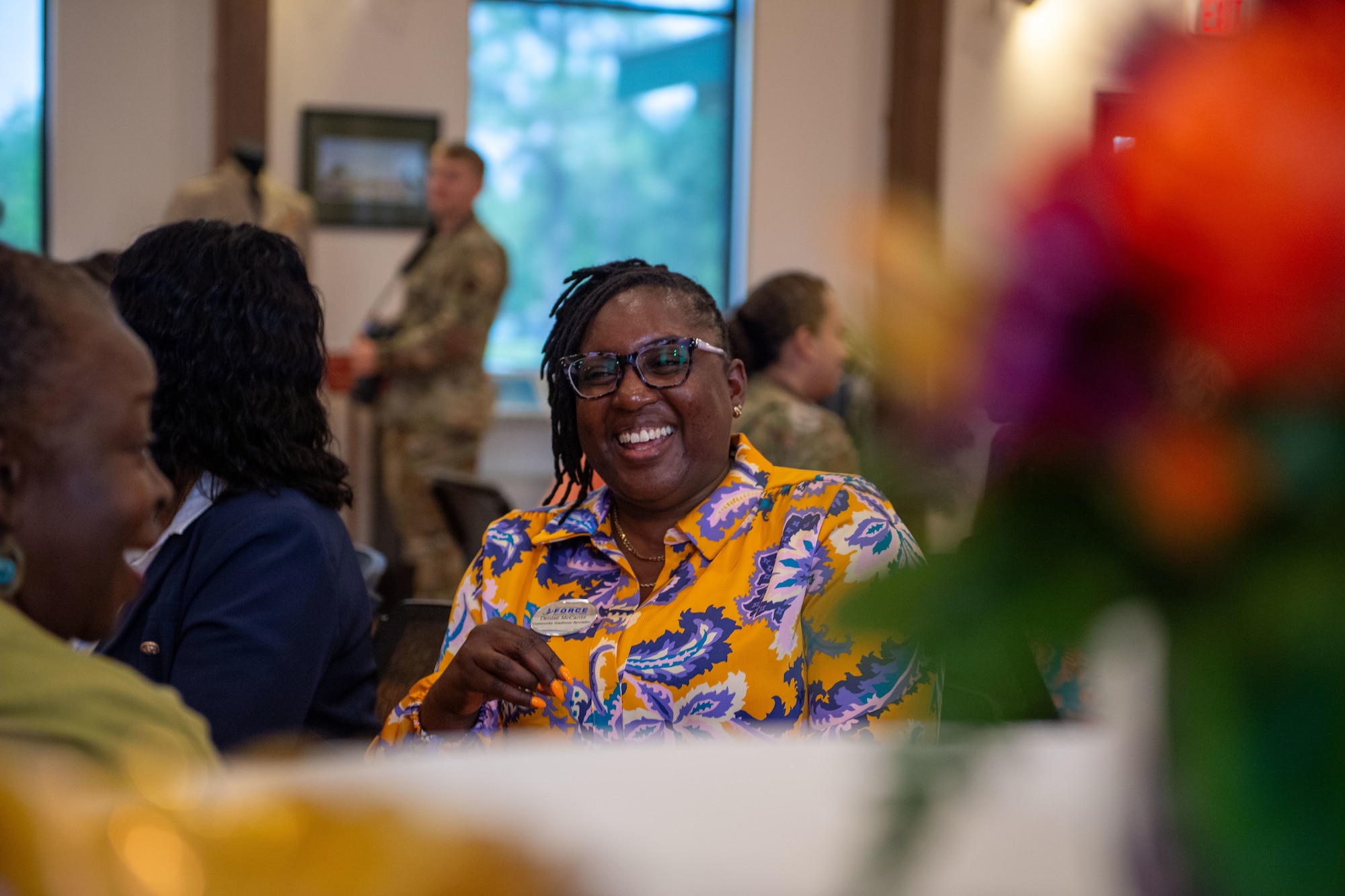 Denise McCants, Project Manager for the Widows and Widowers connection group participates in an ice-breaker exercise during the Widows and Widowers connection group event at Moody Air Force Base, Georgia, April 17, 2024. The Military and Family Readiness Center at Moody has created a safe space where families who have lost a loved one can come to mourn within the company of individuals who have experienced similar tragedy.  (U.S. Air Force photo by 2d Lt. Benjamin Williams)