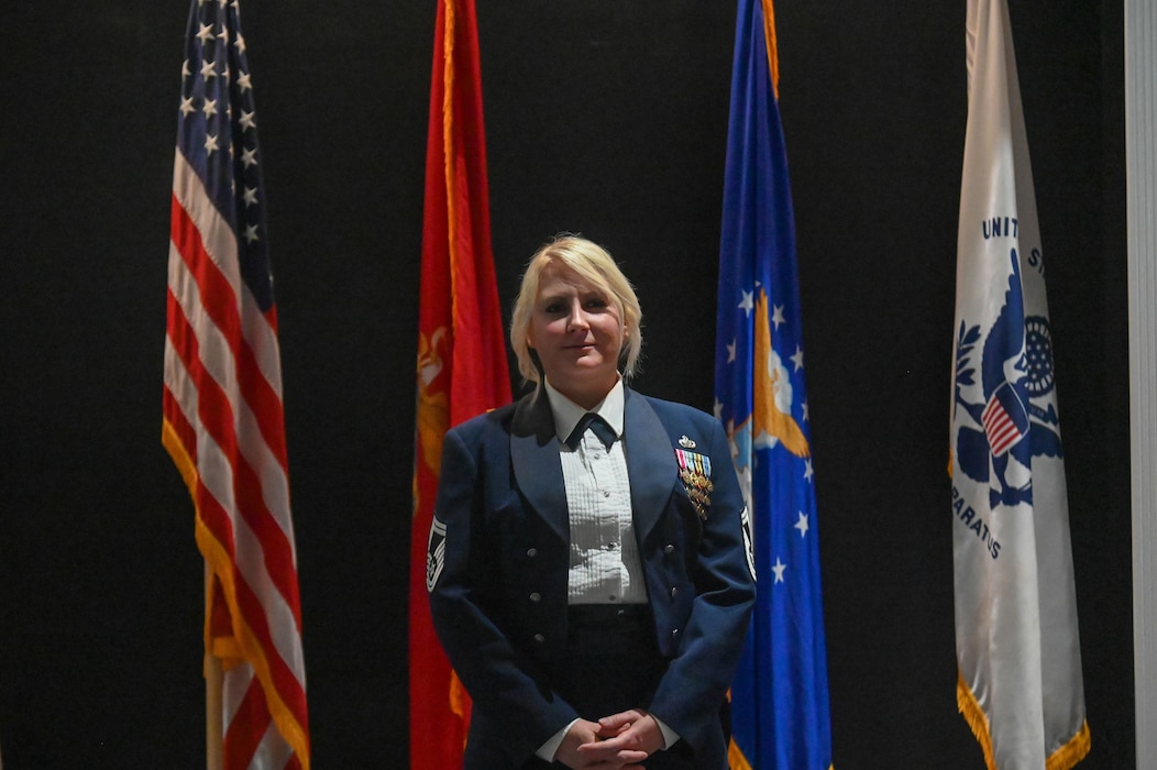 U.S. Air Force Senior Master Sgt. Christina Dykstra, 316th Training Squadron senior enlisted leader, stands after reciting the Chief’s Creed at the Powell Event Center, Goodfellow Air Force Base, Texas, April 19, 2024. The rank of a chief master sergeant in the Air Force is to serve in the highest enlisted grade and hold strategic leadership positions with tremendous influence in the Air Force. (U.S. Air Force photo by Airman James Salellas)