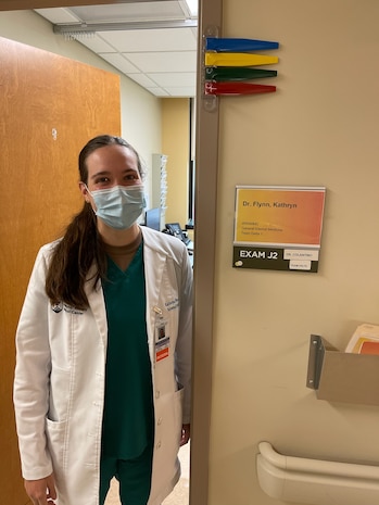 U.S. Navy Lt. (Dr.) Kathryn Flynn, an Internal Medicine resident, takes a break between patients outside her office on April 22, 2024, at Walter Reed National Military Medical Center, Bethesda, Maryland. Photo Credit: U.S. Army Cpt. (Dr.) Brendan Flynn.