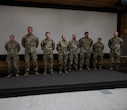 A photo of service members standing in a row.