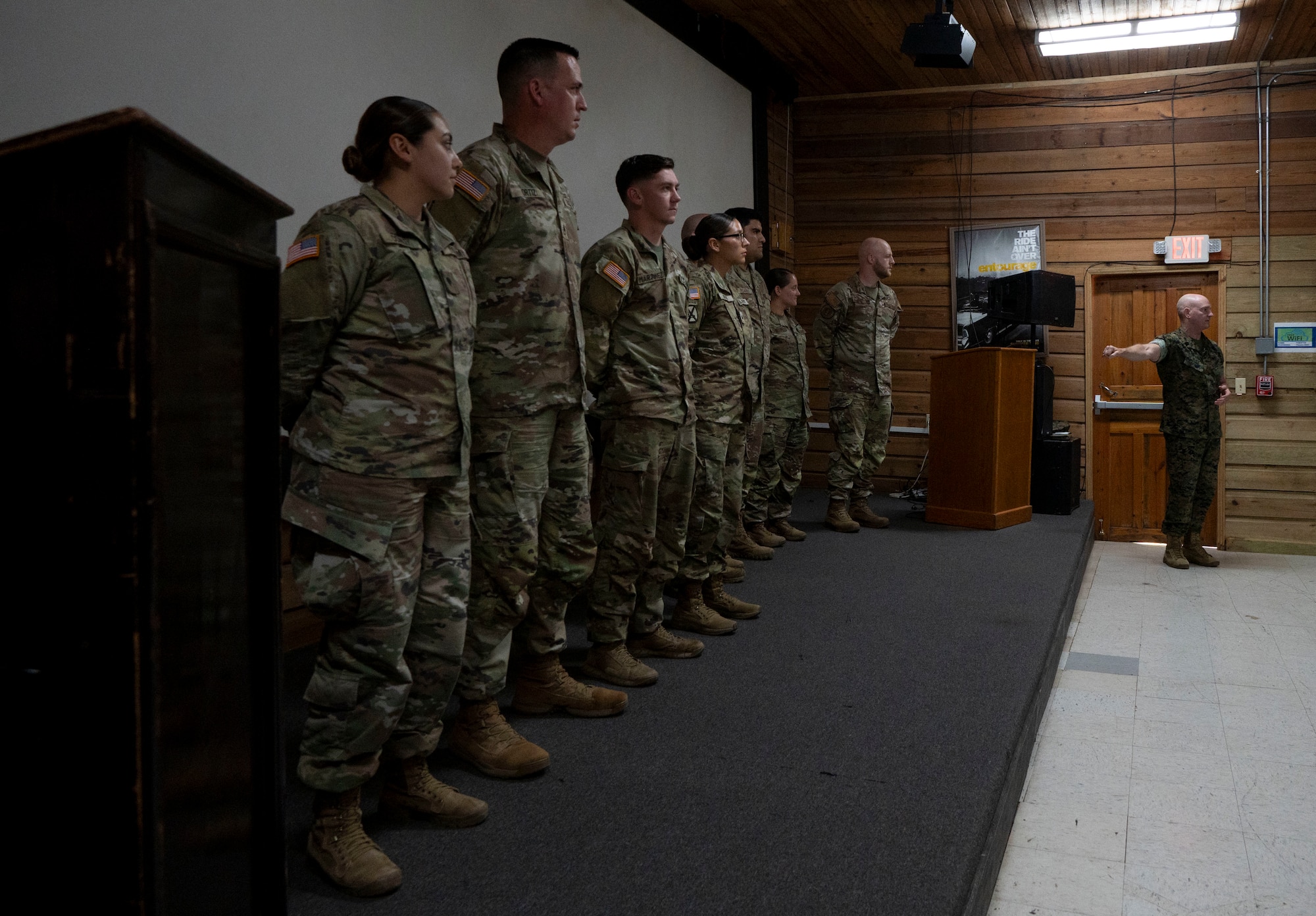 A photo of service members standing in a row.