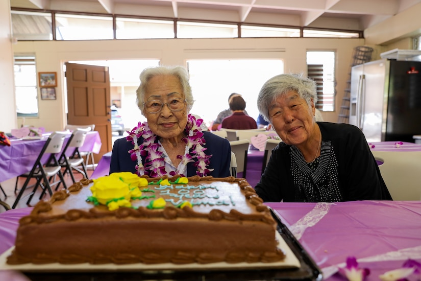 Velma P. Kim, centenarian U.S. Army spouse and steadfast supporter of Schofield Barracks, left, and Yong Suk Potts, former proprietor of renowned Dong Yang Inn, pose for a photo at Wahiawa United Church of Christ April 21, 2024. The potluck was hosted honoring Kim's 100th birthday and lifetime of service to the military community, and family.  (U.S. Army photo by Staff Sgt. Andre Taylor)