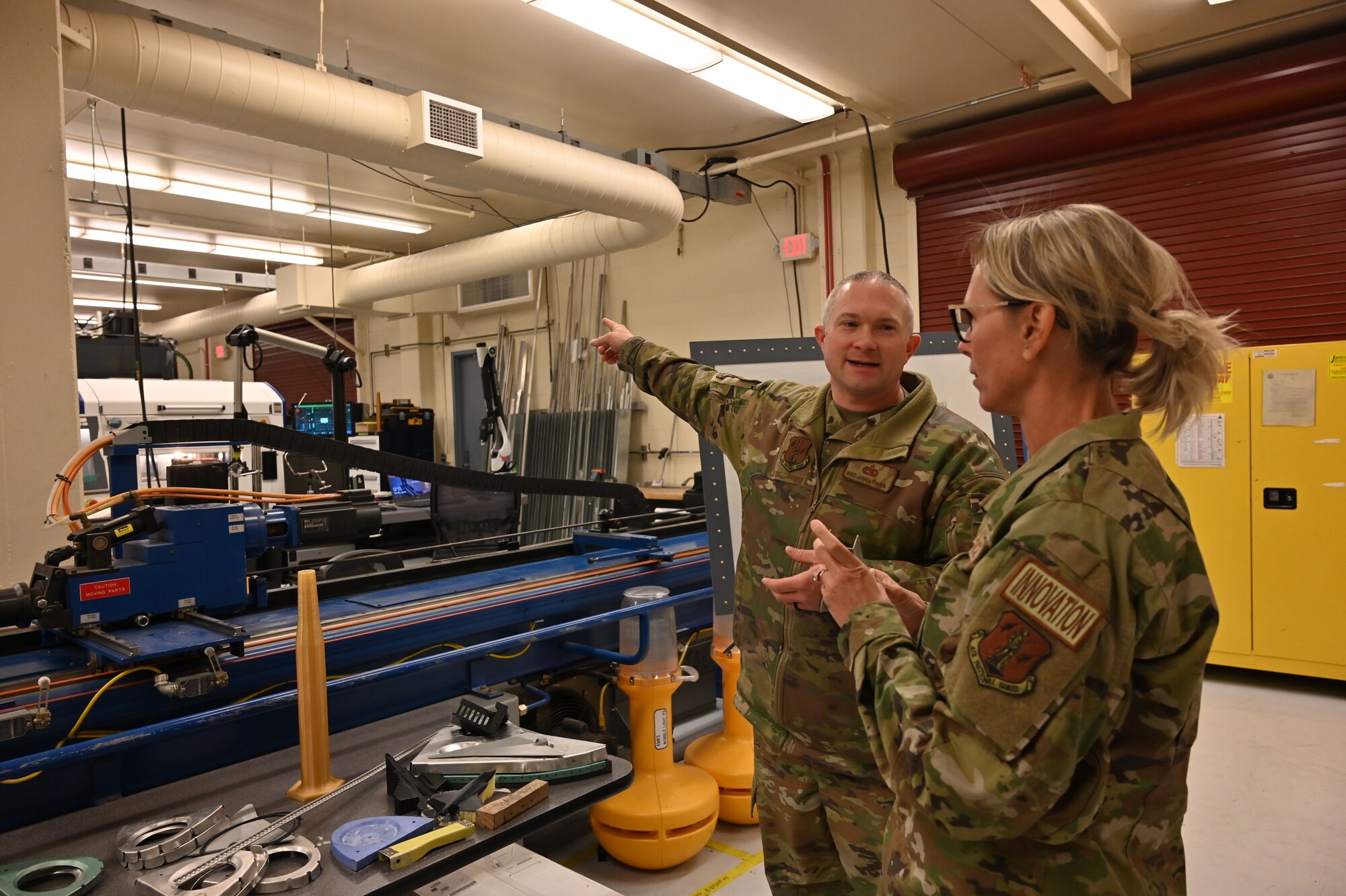 Two military members talking