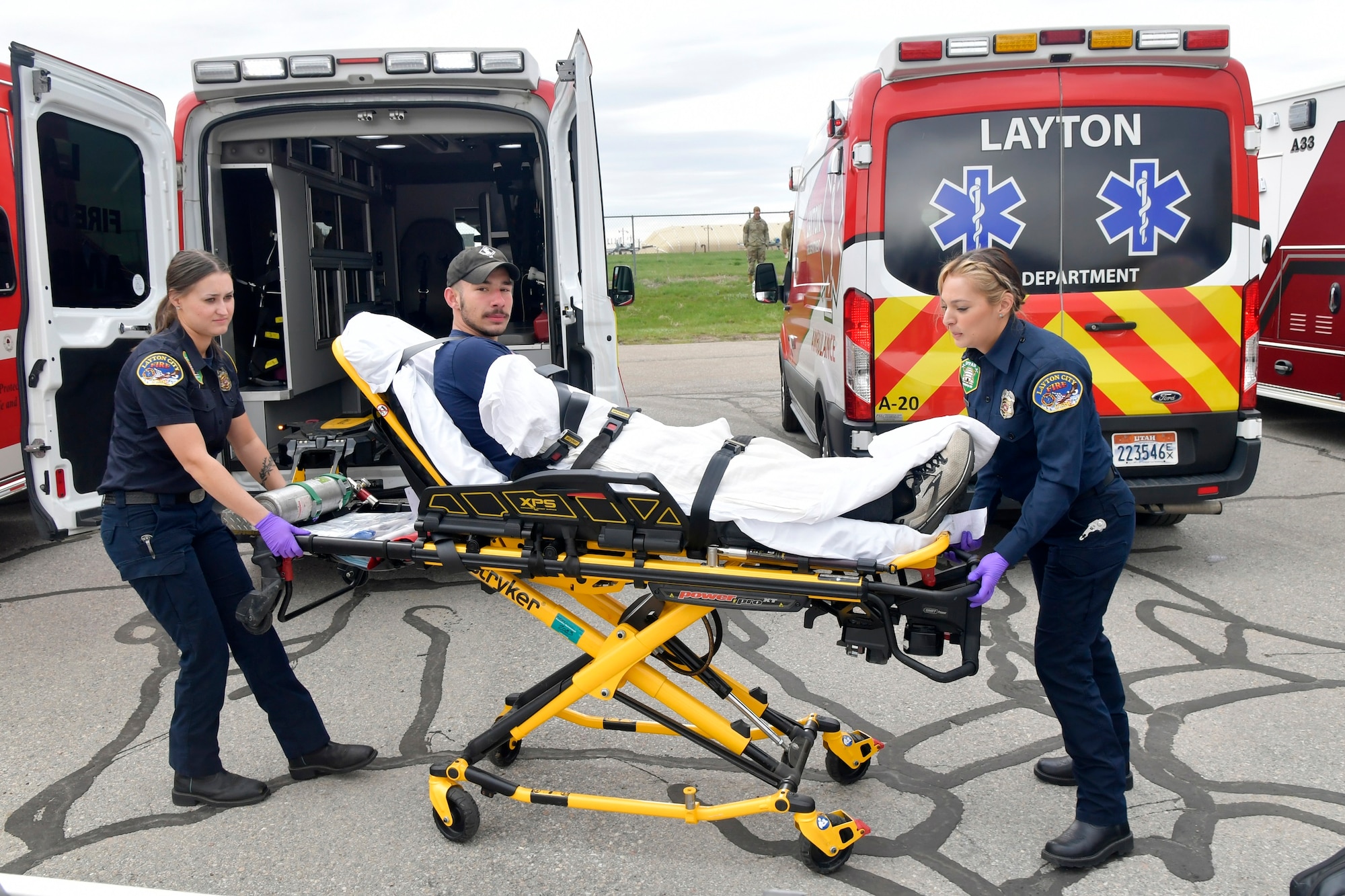 Members of various Hill Air Force Base units teamed with community responders April 17 for a joint mass casualty exercise. The exercise simulated a performing aircraft crashing into a group onlookers, causing the demand of patients to exceed resources and capabilities. The aim of the exercise was to maximize training for responders, test and evaluate emergency functions and response, and enhance readiness, integration, and response skills.