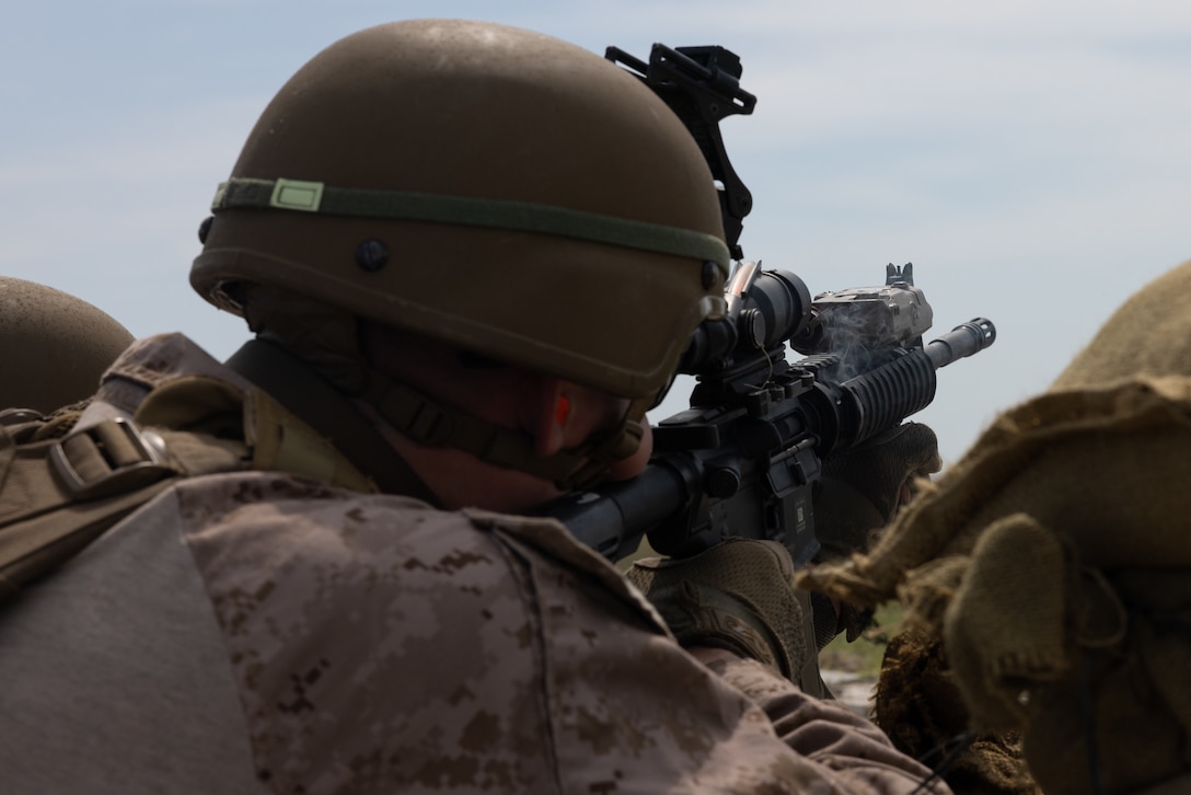 U.S. Marine Corps Lance Cpl. Zackery Potter, a native of Pennsylvania and a low-altitude air-defense (LAAD) gunner with Bravo Battery, 2nd LAAD Battalion, fires an M4 carbine during a counter-unmanned aircraft system (UAS) range on Marine Corps Base Camp Lejeune, North Carolina, April 16, 2024. 2nd LAAD Battalion conducted a dynamic, tactical scenario-driven counter-UAS aerial-gunnery range in which Marines had to shoot, maneuver, and communicate while directly engaging UAS aircraft. (U.S. Marine Corps photo by Lance Cpl. Anakin Smith)